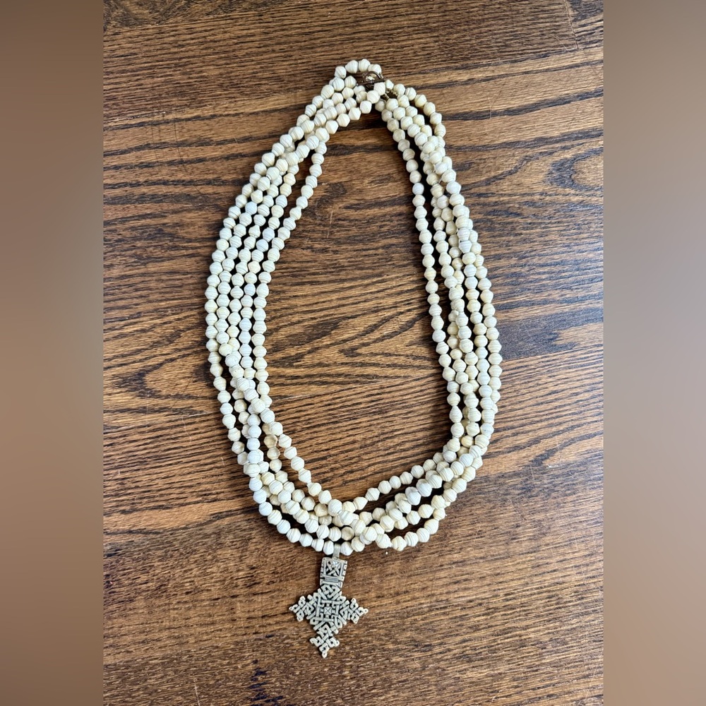Akola Cream Multi-Strand Beaded Necklace with Decorative Pendant
